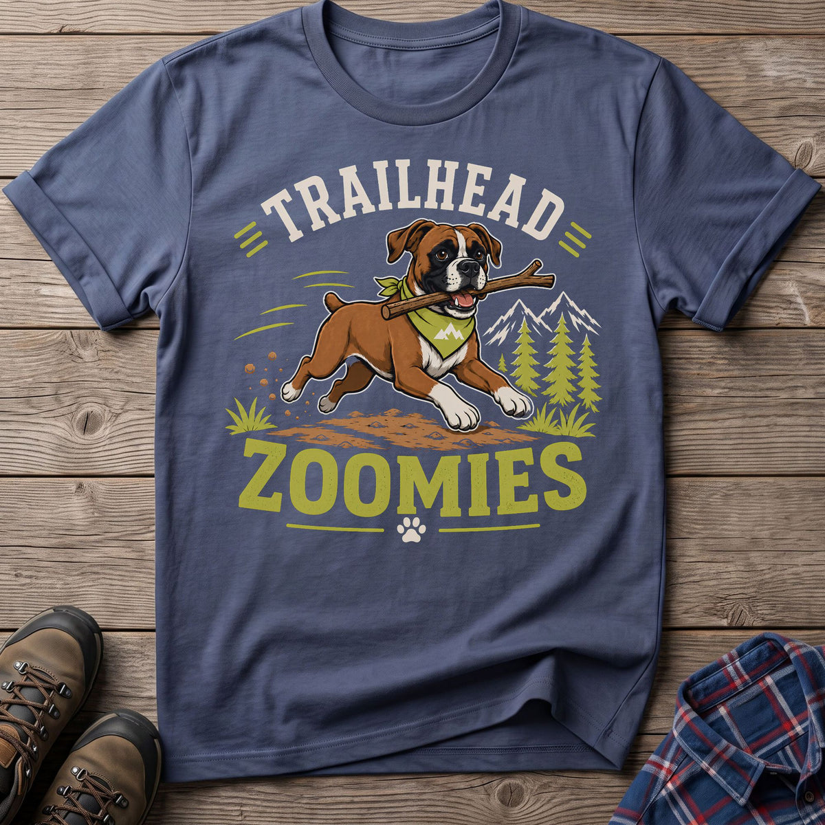 Boxer dog with stick and bandana, text "TRAILHEAD ZOOMIES" and mountains.