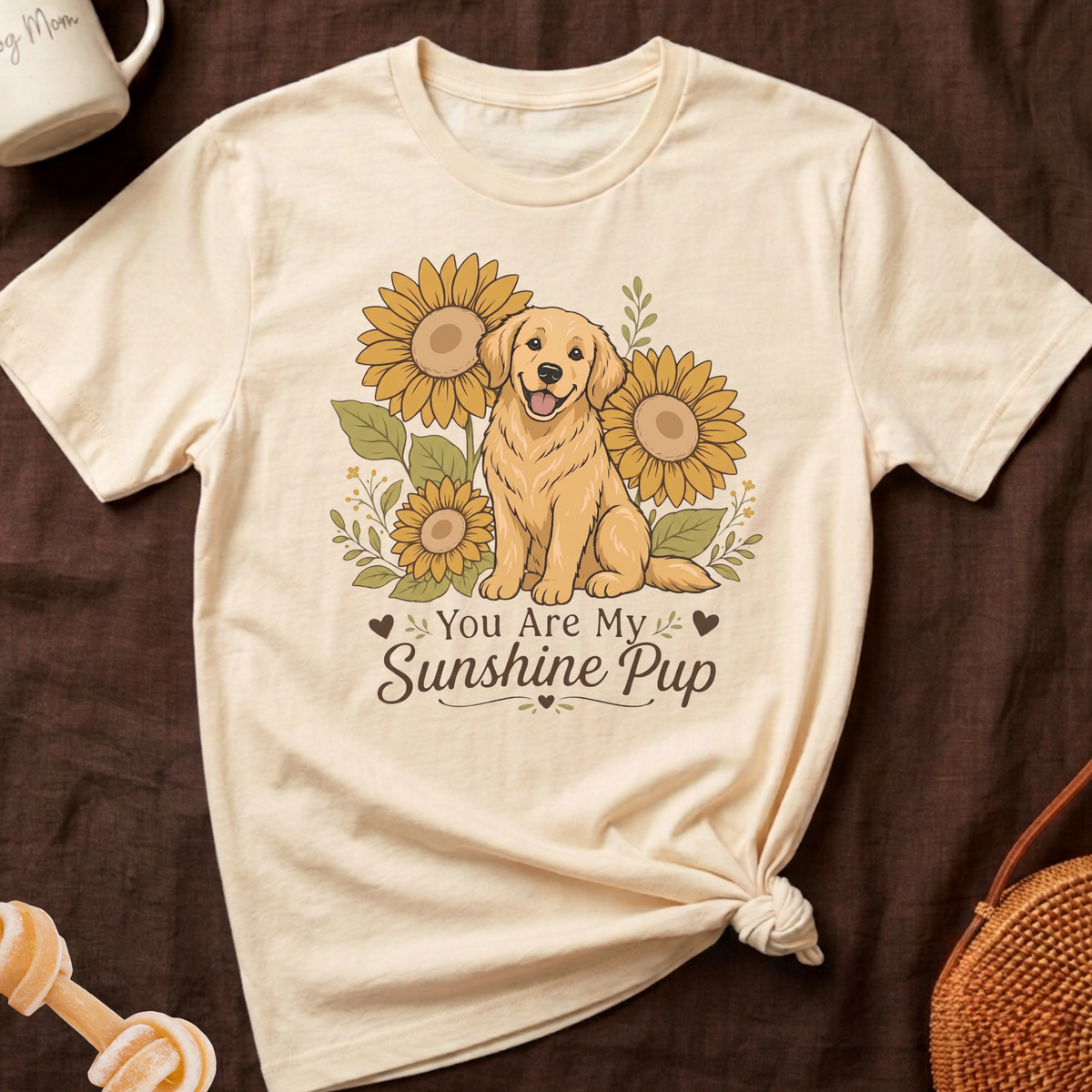 Cream t-shirt with golden retriever and sunflowers graphic that says "You Are My Sunshine Pup".