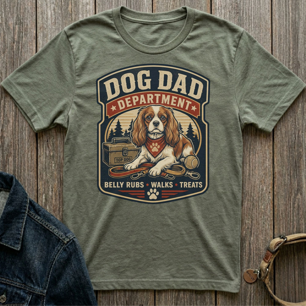 Dog Dad Department with Cavalier King Charles Spaniel, leash, and tennis ball.