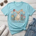 Light blue t-shirt with a chihuahua and tulips graphic that reads "Paws in Bloom".