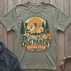 Dog Parent Social Club t-shirt with Pomeranian dog, camping scene, and text.