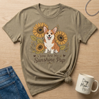 Corgi surrounded by sunflowers on a t-shirt with text "You Are My Sunshine Pup."