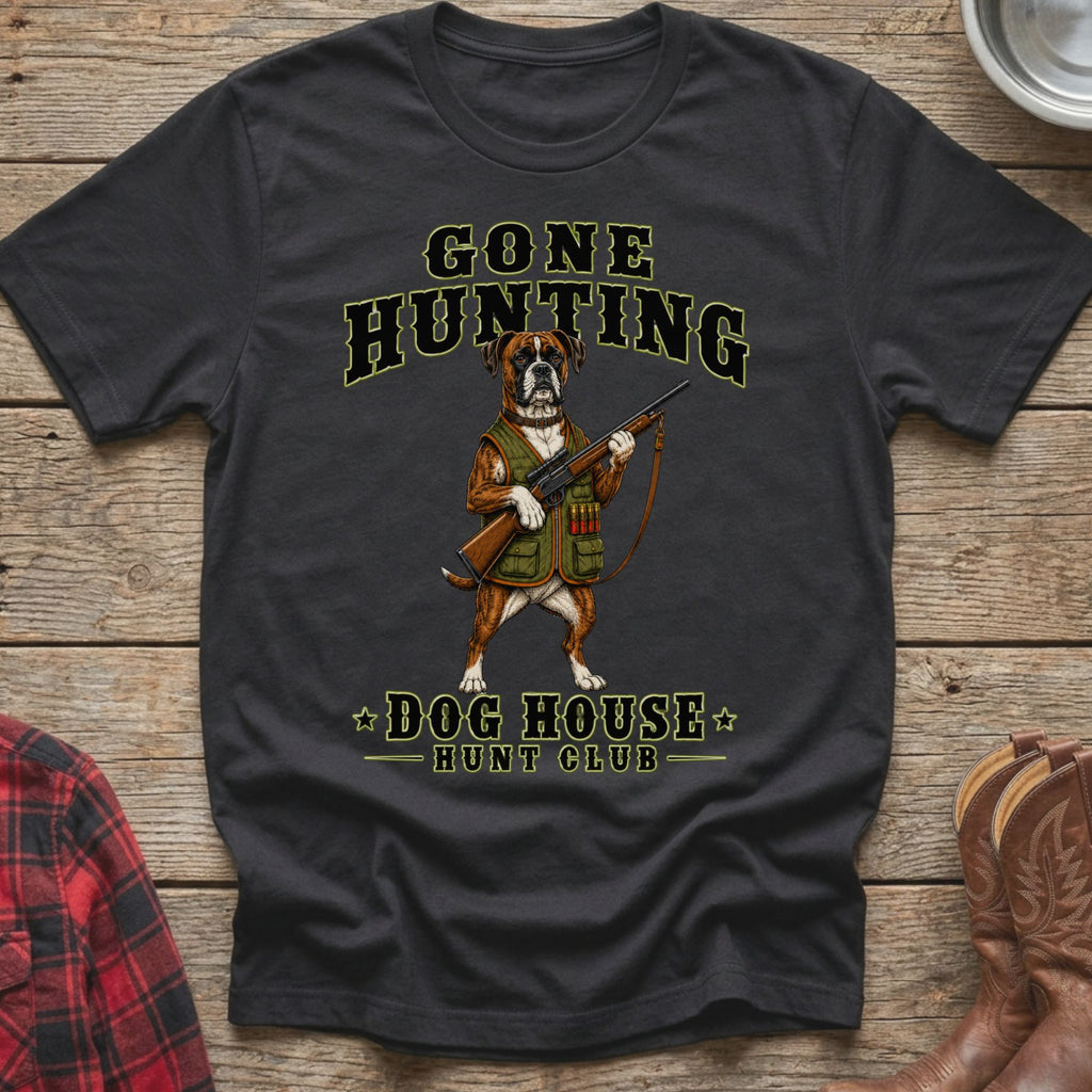 T-shirt with a boxer dog wearing hunting vest holding a rifle, text "GONE HUNTING DOG HOUSE HUNT CLUB".