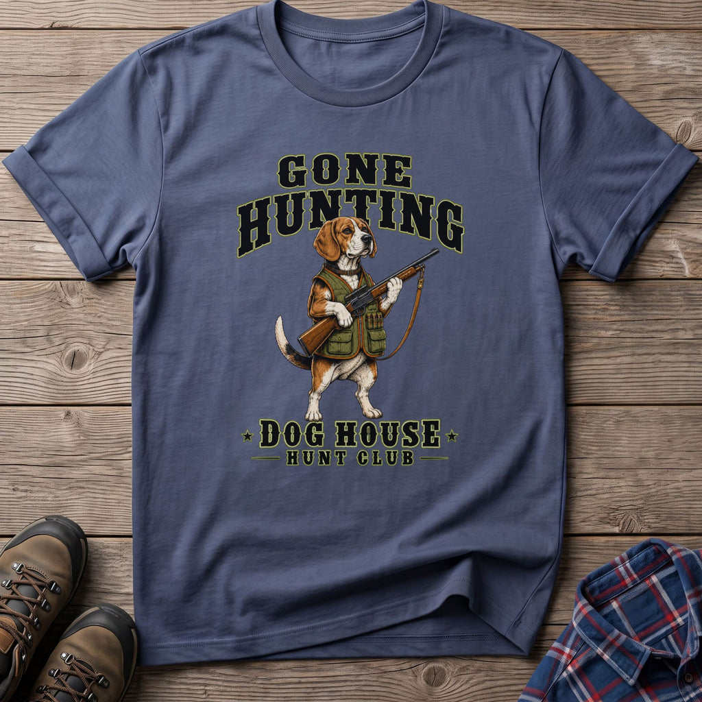 Beagle dog in hunting vest holding rifle with "Gone Hunting Dog House Hunt Club" text.
