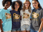 Four women model t-shirts with a Pomeranian and sunflowers graphic, reading "You Are My Sunshine Pup".