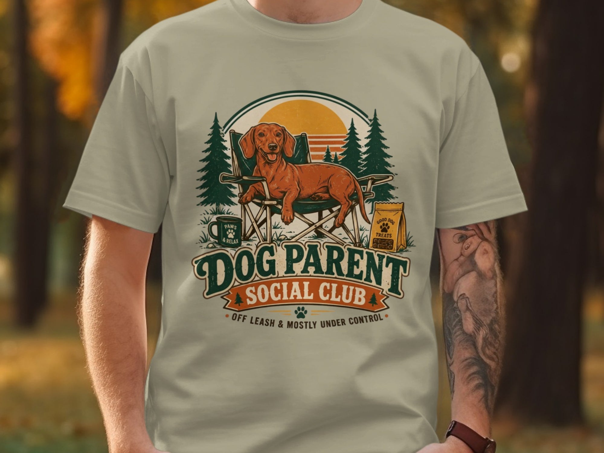 Dachshund sitting in camping chair with "Dog Parent Social Club" text.