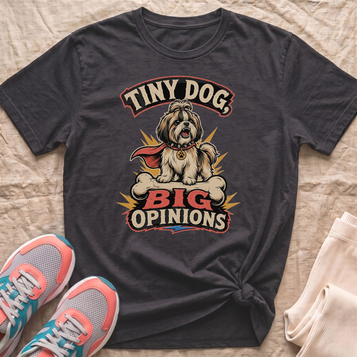 Dark gray t-shirt with "Tiny Dog, Big Opinions" graphic and dog illustration.