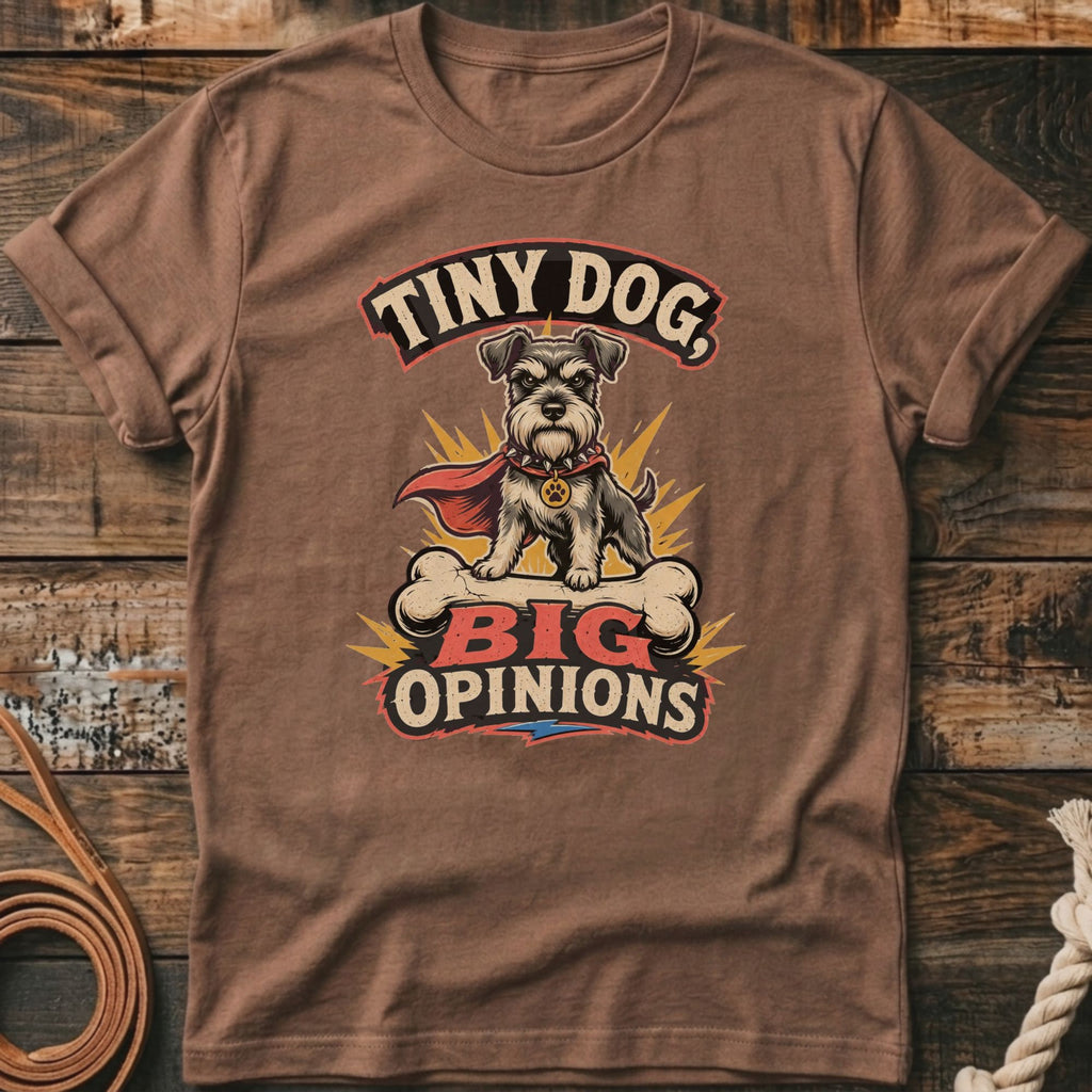 Brown t-shirt with a graphic of a schnauzer wearing a cape and the text "Tiny Dog, Big Opinions."