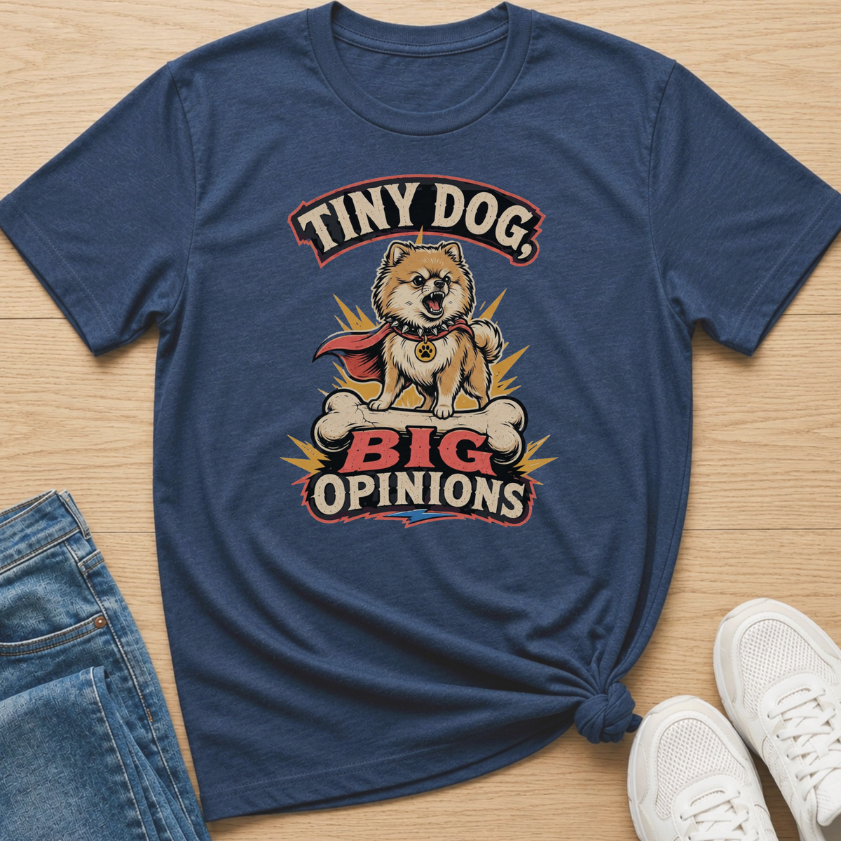Navy t-shirt with graphic "Tiny Dog, Big Opinions" and a Pomeranian on a bone.