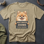 T-shirt featuring a Pomeranian dog in a mugshot with text "Most Wanted Zoomie Reckless Speeding".