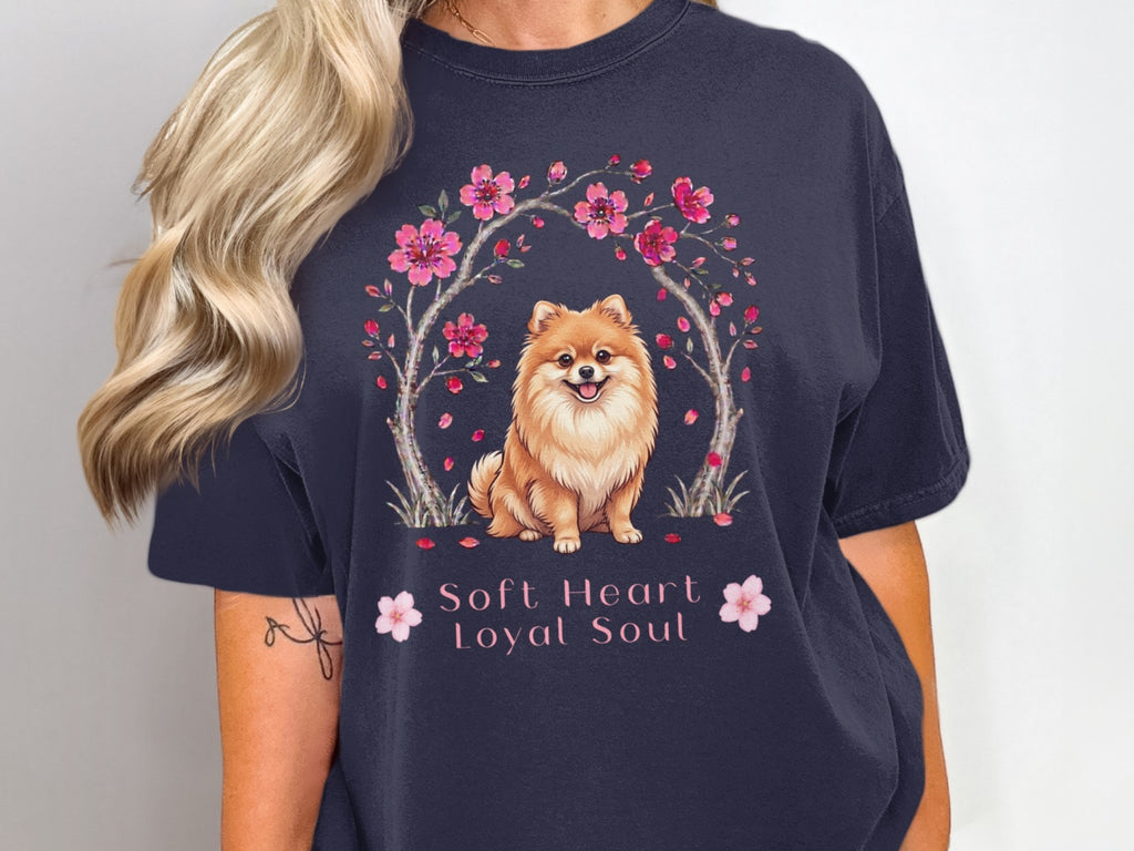Dark navy t-shirt with a Pomeranian dog and cherry blossoms, text reads "Soft Heart Loyal Soul".