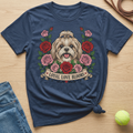 Shih Tzu dog and roses graphic on a navy blue t-shirt with text "Loyal Love Blooms".