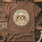 Brown t-shirt with a circular graphic featuring a dog and text "I RESCUED MY BEST FRIEND".