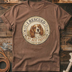 Brown t-shirt with a dog illustration and text "I RESCUED MY BEST FRIEND."