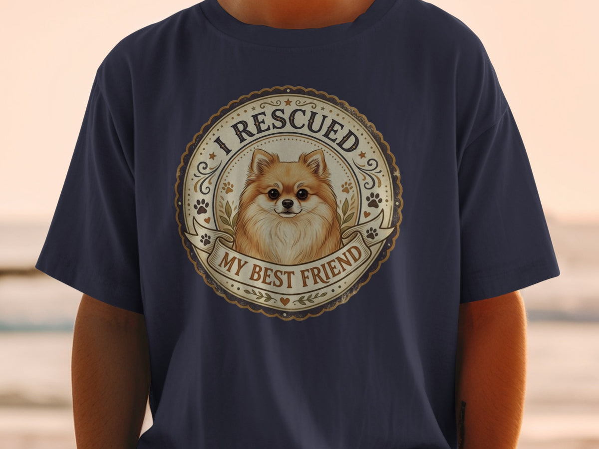 T-shirt with a rescued Pomeranian dog graphic reading "I RESCUED MY BEST FRIEND".