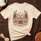 Cream t-shirt with dog and roses graphic, reading "Loyal Love Blooms."