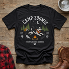 Black t-shirt with "CAMP ZOOMIE" graphic and a dog running by a campfire.