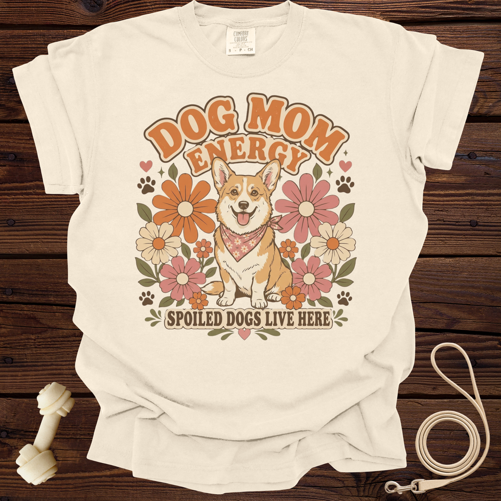 T-shirt with a corgi wearing a bandana surrounded by flowers and text.
