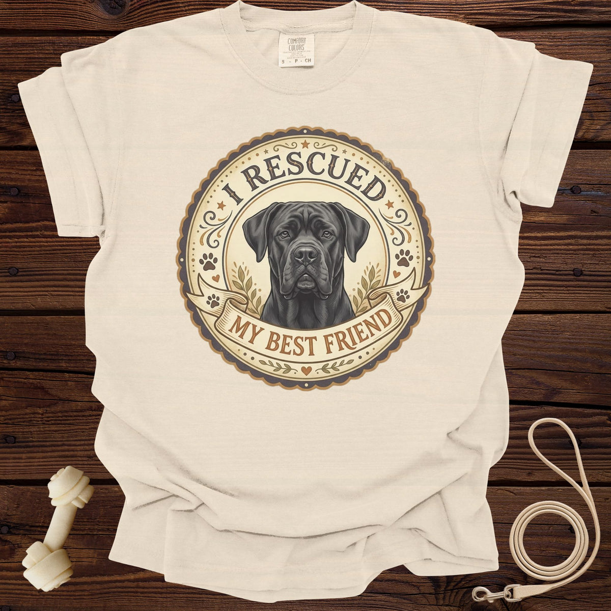 Cream t-shirt with a Cane Corso dog graphic and "I RESCUED MY BEST FRIEND" text.