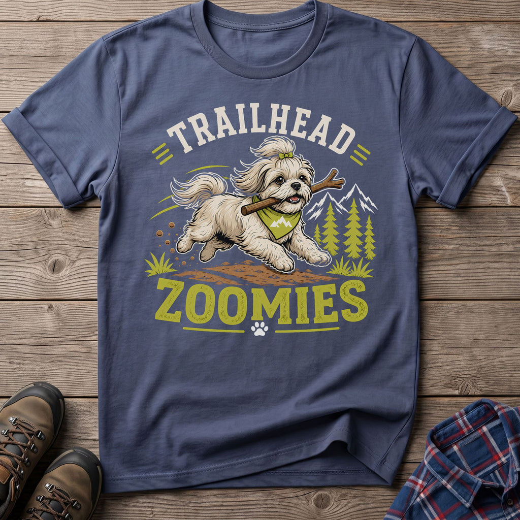 Shih Tzu dog with stick and bandana, text "Trailhead Zoomies"