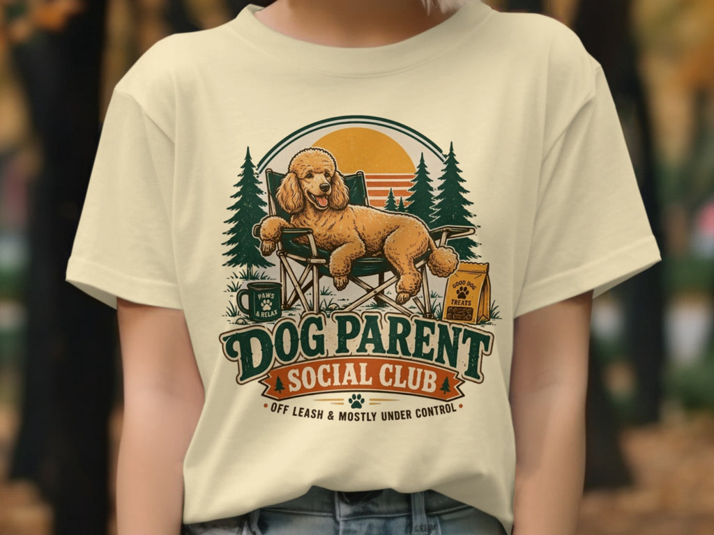 Cream t-shirt with "Dog Parent Social Club" graphic featuring a poodle on a chair.