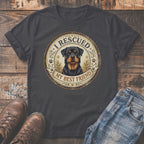 Dark grey t-shirt with Rottweiler graphic reading "I RESCUED MY BEST FRIEND".