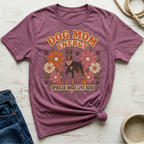 T-shirt with "Dog Mom Energy Spoiled Dogs Live Here" text, a Doberman, and flowers.