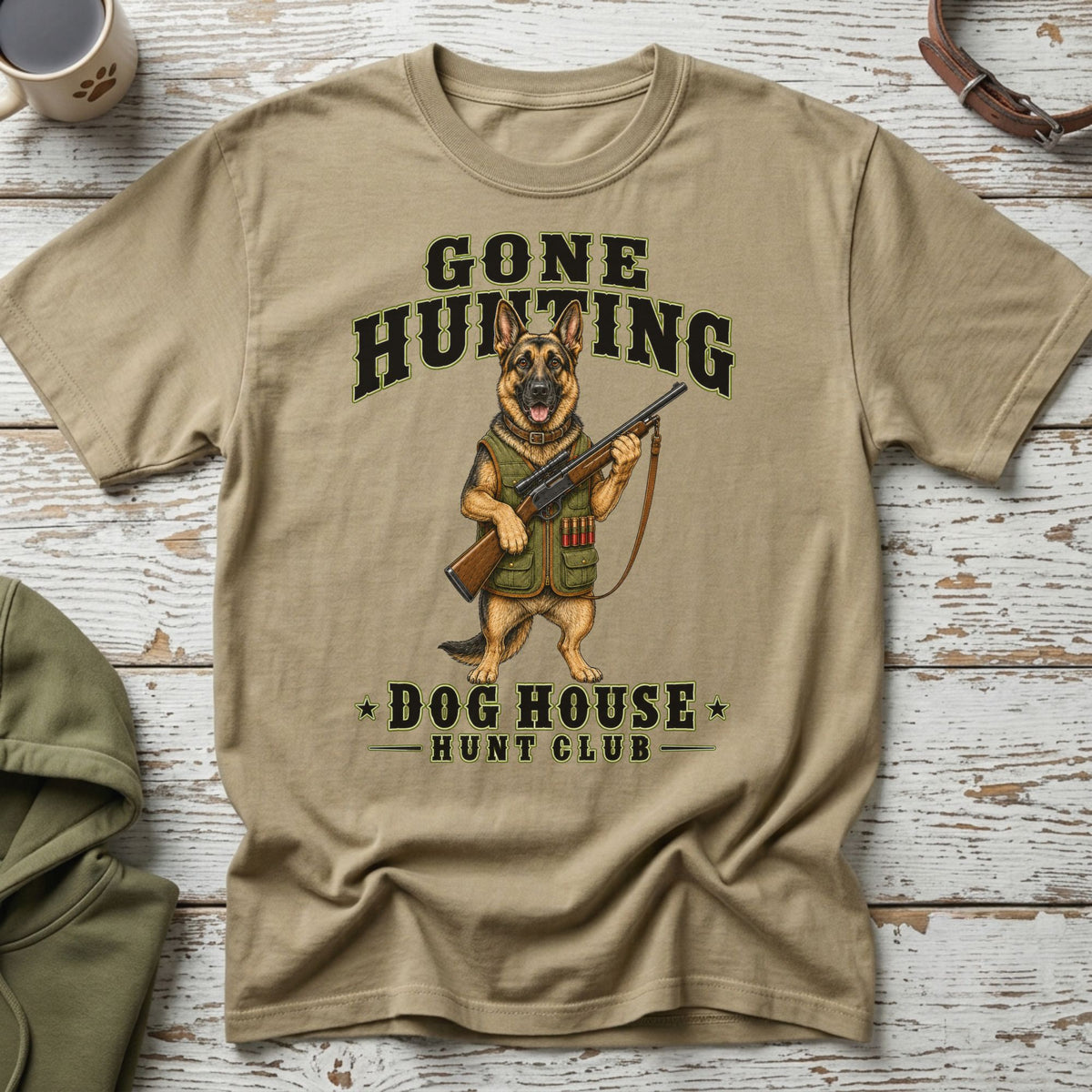 T-shirt with German Shepherd holding a rifle, text "GONE HUNTING DOG HOUSE HUNT CLUB".