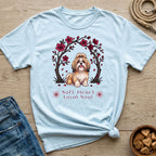 Light blue t-shirt with a Shih Tzu dog surrounded by cherry blossoms and text.
