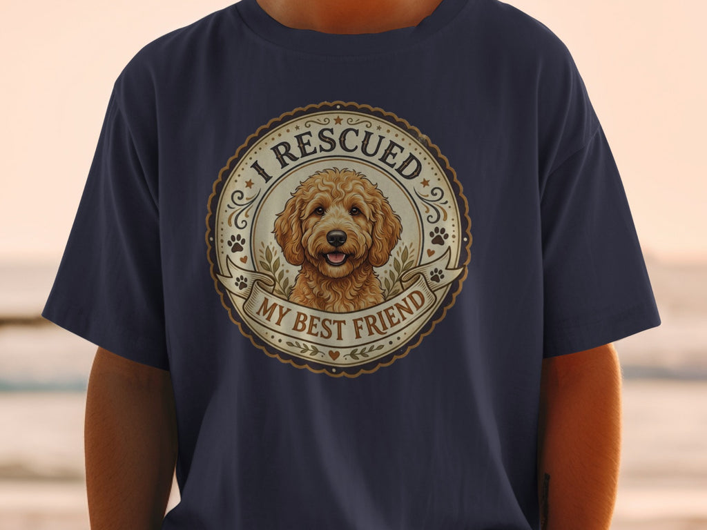 Navy t-shirt with a circular graphic of a golden doodle and text "I RESCUED MY BEST FRIEND".