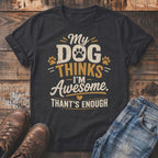Dark t-shirt with text "My Dog Thinks I'm Awesome. Thant's Enough" and paw prints.