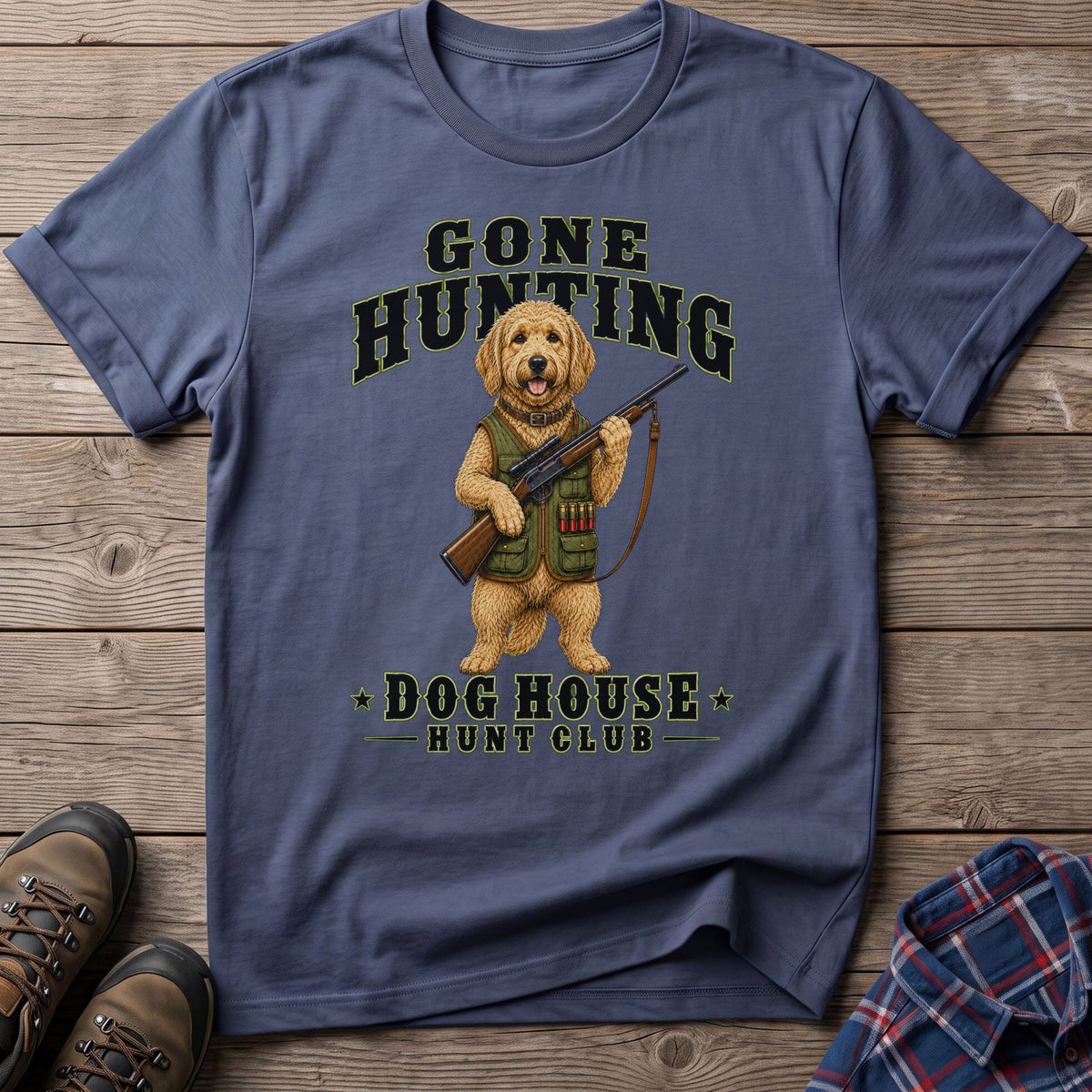 T-shirt with dog wearing hunting vest, holding rifle, and text "GONE HUNTING DOG HOUSE HUNT CLUB."