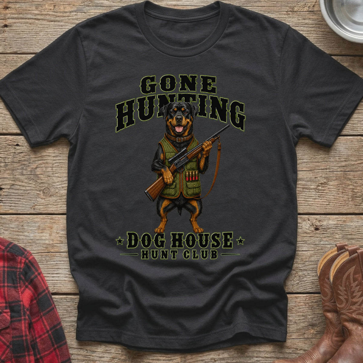 Black t-shirt with a Rottweiler holding a rifle and text "GONE HUNTING DOG HOUSE HUNT CLUB".