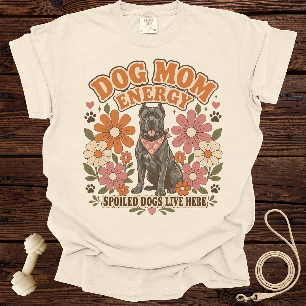 Cream t-shirt with "Dog Mom Energy" graphic featuring a dog and flowers.