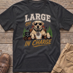 Dog wearing sunglasses and a collar, sitting in a chair, with text "LARGE AND IN CHARGE".