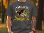 T-shirt graphic: Cavalier King Charles Spaniel running with stick, text "Trailhead Zoomies".