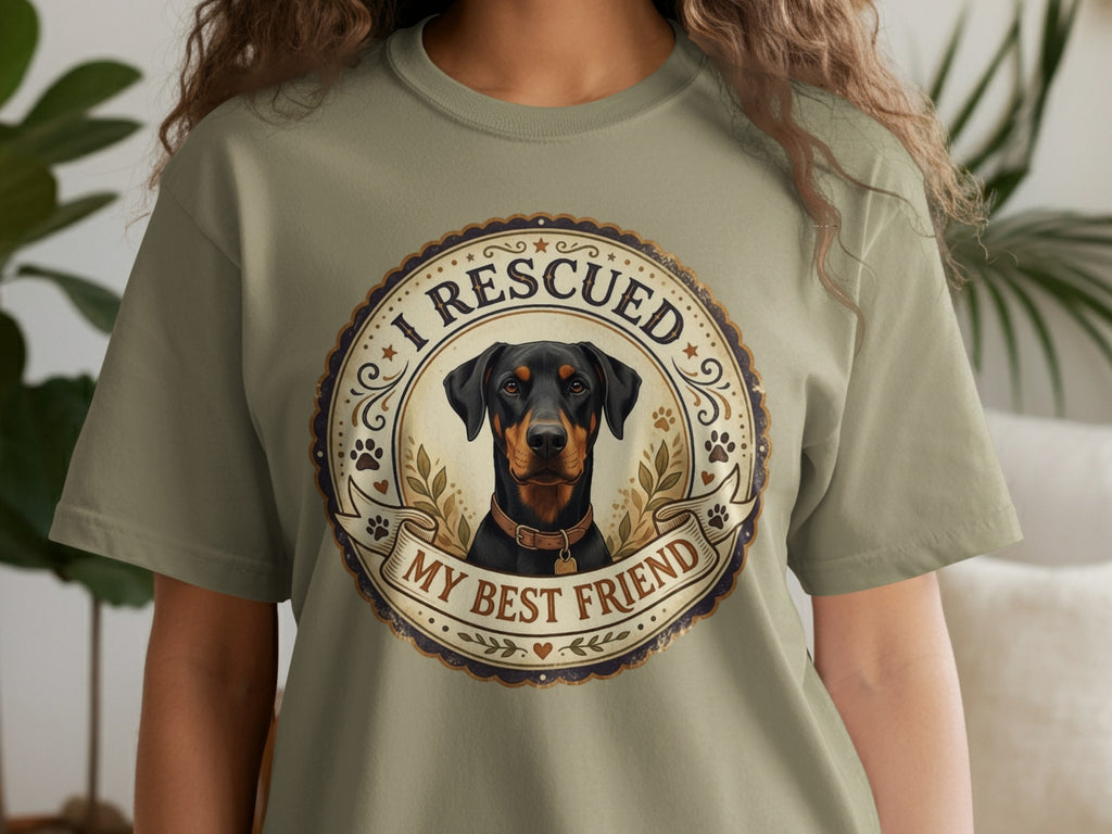 Doberman portrait with text "I RESCUED MY BEST FRIEND" on a t-shirt.