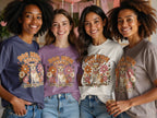 Four women wear t-shirts with a dog and floral graphic reading "Dog Mom Energy."