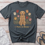 Golden retriever surrounded by colorful tulips with text "Paws in Bloom."