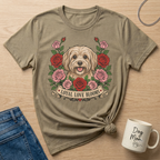 T-shirt with dog surrounded by roses and banner reading "Loyal Love Blooms".