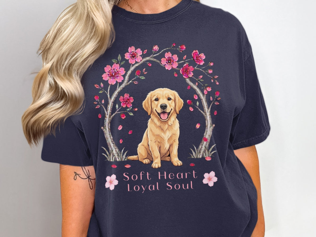 Golden retriever sits under cherry blossoms with text "Soft Heart Loyal Soul."