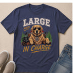 Golden retriever wearing sunglasses and a tag that says "The Boss" on a t-shirt.