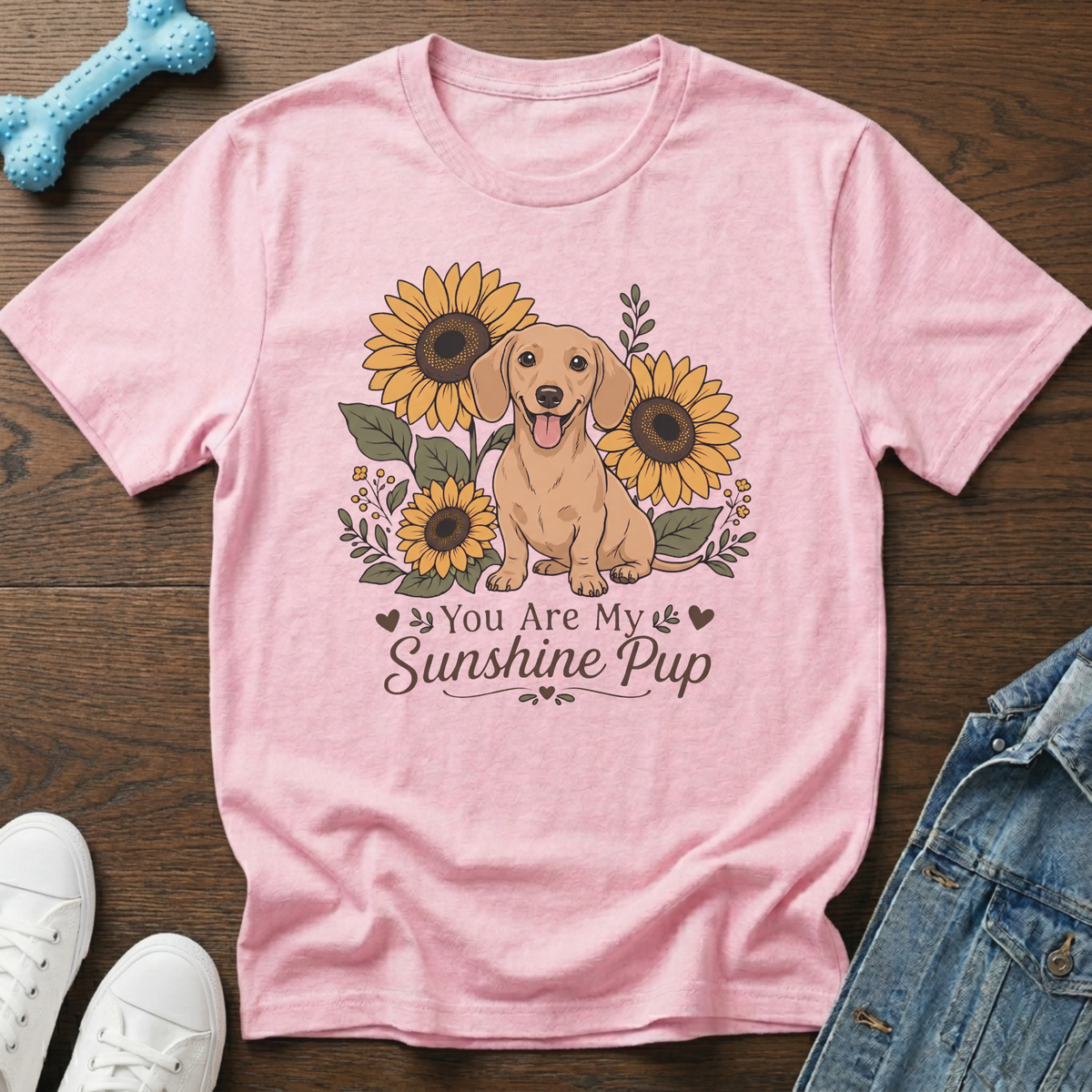 Pink t-shirt with a dachshund and sunflowers, text reads "You Are My Sunshine Pup".