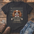 T-shirt graphic: Cavalier King Charles Spaniel mugshot reading "Most Wanted Zoomie Reckless Speeding".