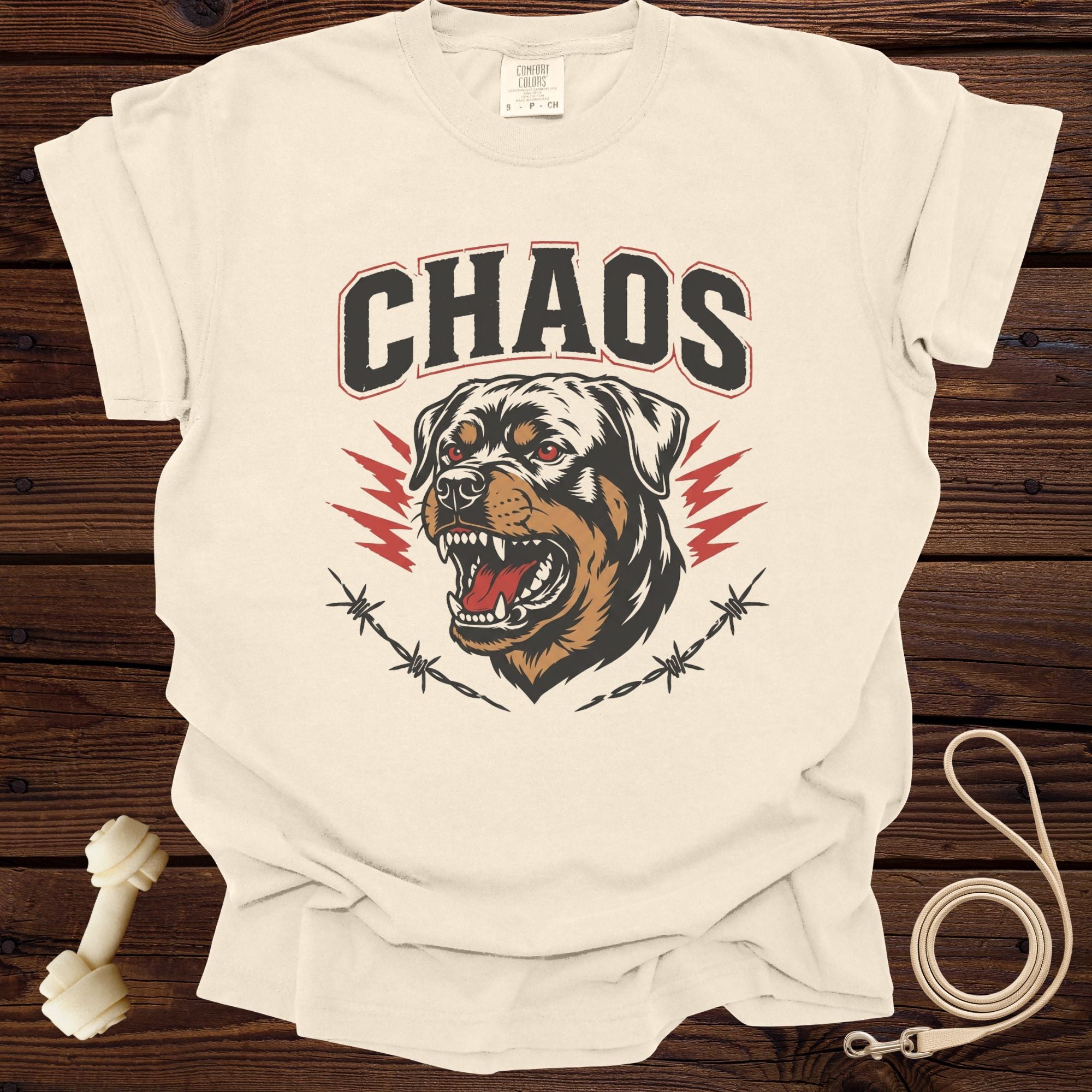 Cream t-shirt with "CHAOS" text and a Rottweiler graphic with barbed wire.