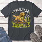 Golden retriever with stick runs through woods with "Trailhead Zoomies" text.
