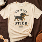 Cream t-shirt with dachshund graphic and text "Official Stick Transportation Dept."
