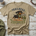 Dachshund with stick in mouth on t-shirt with text "TRAILHEAD ZOOMIES".