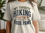 T-shirt with text "My favorite hiking partner has four paws".