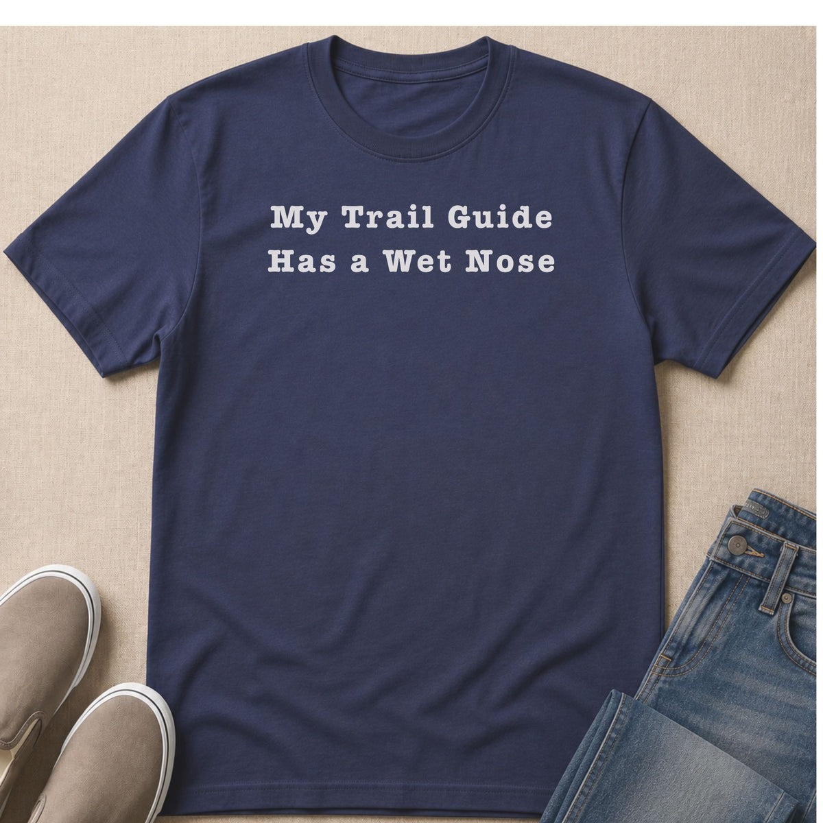 Navy t-shirt with white text "My Trail Guide Has a Wet Nose".